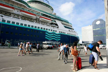 salvador, bahia, brazil - december 28, 2014: passengers are seen disembarking from a cruise ship at the maritime terminal in the port of Salvador.のeditorial素材