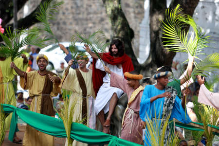salvador, bahia, brazil - march 29, 2015: Catholics are seen carrying palm branches during procession of branches in Salvador city.のeditorial素材