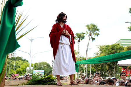 salvador, bahia, brazil - march 29, 2015: Catholics are seen carrying palm branches during procession of branches in Salvador city.のeditorial素材