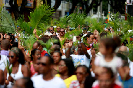 salvador, bahia, brazil - march 29, 2015: Catholics are seen carrying palm branches during procession of branches in Salvador city.のeditorial素材