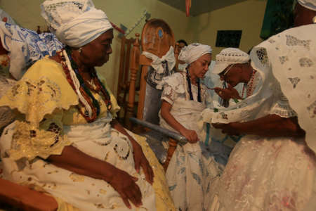 simoes Filho, bahia, barazil - february 27, 2016: integrants of the Candomble religion are seen...