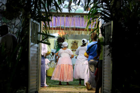 simoes Filho, bahia, barazil - february 27, 2016: integrants of the Candomble religion are seen during a religious celebration in a terreiro in the city of Simoes Filho.のeditorial素材