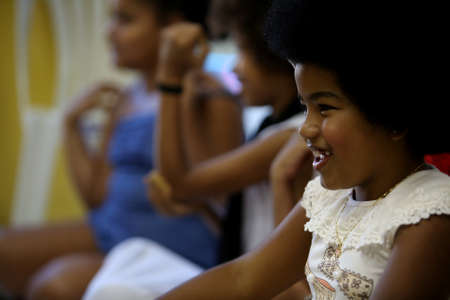salvador, bahia, brazil - october 13, 2017: Children of black ethnicity are seen in a beauty salon in the city of Salvador.のeditorial素材