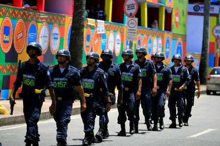 Salvador, Bahia, Brazil - February 3, 2014: Members of the Municipal Guard are seen queuing up during patrol on the carnalval circuit in the city of Salvador.のeditorial素材