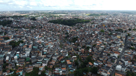 Salvador, Bahia, Brazil - September 9, 2021: Aerial view of popular favela houses in the Engomadeira...