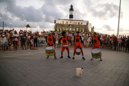 salvador, bahia, brazil - september 12, 2021: People are seen crowded during sunset near Farol da Barra in Salvador city.のeditorial素材