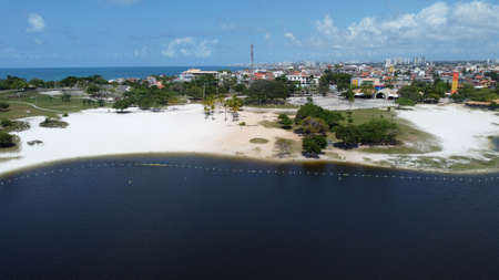 Salvador, Bahia, Brazil - September 16, 2021: aerial view of Lagoa do Abaete, in the neighborhood of Itapua in the city of Salvador. The lake is located in the Metropolitan Park of Abaete.のeditorial素材