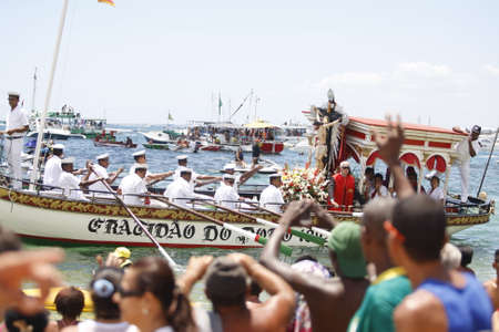 salvador, bahia, brazil - january 1, 2016: image of Bom Jesus dos Navegantes being carried by devotees on Boa Viagem beach after crossing the sea at Baia de Todos os Santos in Salvador.のeditorial素材
