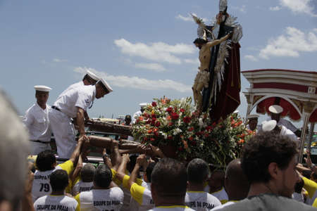 salvador, bahia, brazil - january 1, 2015: image of Bom Jesus dos Navegantes being carried by devotees on Boa Viagem beach after crossing the sea at Baia de Todos os Santos in Salvador.のeditorial素材