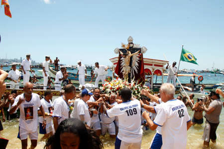 salvador, bahia, brazil - january 1, 2016: image of Bom Jesus dos Navegantes being carried by devotees on Boa Viagem beach after crossing the sea at Baia de Todos os Santos in Salvador.のeditorial素材