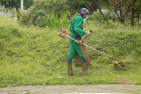salvador, bahia, brazil - november 24, 2021: public cleaning worker uses individual protection...