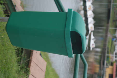 Salvador, Bahia, Brazil - December 2, 2021: Waste basket made of plastic is seen in a park in the city of Salvador.の写真素材