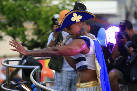 Salvador, Bahia, Brazil - March 4, 2014: Singer Leo Santana performing in an electric trio during Carnival in the city of Salvador.のeditorial素材