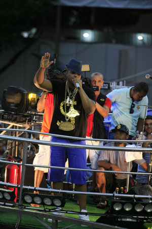 Salvador, Bahia, Brazil - March 4, 2014: Singer Robissao performing in an electric trio during Carnival in the city of Salvador.のeditorial素材
