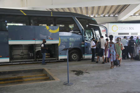 Salvador, Bahia, Brazil - December 28, 2021: Passengers while boarding an intercity bus at Salvador...