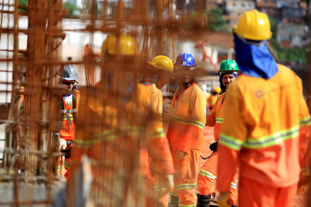 salvador, bahia, brazil - march 23, 2017: Workers working on construction of a bus station in Salvador city.のeditorial素材