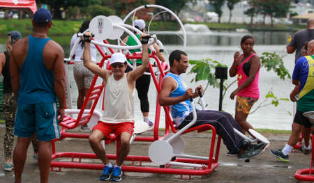 salvador, bahia, brazil - september 1, 2015: people practicing physical activity in an outdoor gym...