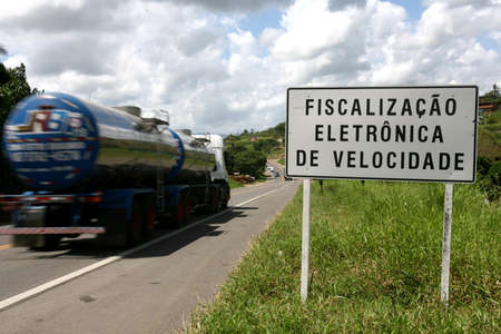 itabuna, bahia, brazil - january 13, 2012: traffic sign board indicates electronic speed inspection on federal highway BR 101 in the city.のeditorial素材