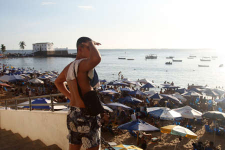 Salvador, Bahia, Brazil - February 5, 2022: people at Porto da Barra beach in Salvador city.のeditorial素材