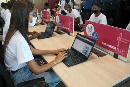 Salvador, Bahia, Brazil - February 9, 2022: Young people using leptor computer in a training project...