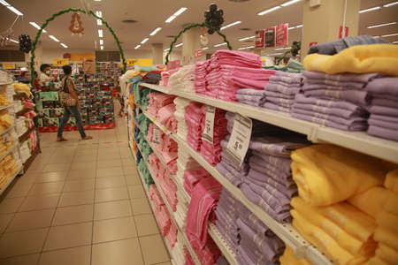 salvador, bahia, brazil - november 26, 2021: Customers seen in the clothing department of a supermarket in the city of Salvador.のeditorial素材