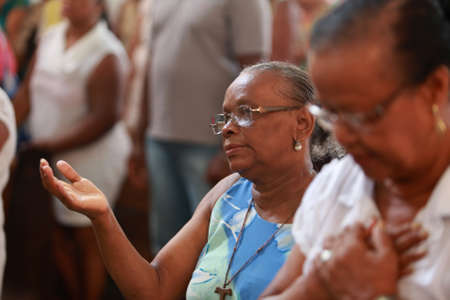 Salvador, Bahia, Brazil - January 25, 2015: Devotees of Sao Lazaro participate in the festivities in honor of the saint at the church in the Federacao neighborhood in the city of Salvador.のeditorial素材