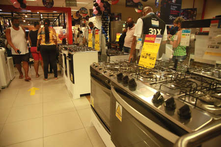 salvador, bahia, brazil - november 26, 2021:customers seen in the appliance department of a supermarket in the city of Salvador.のeditorial素材