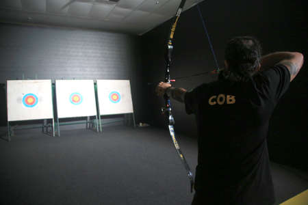 Salvador, Bahia, Brazil - March 20, 2022: Archer demonstrates during the II Brazilian Olympic Congress at the Convention Center in the city of Salvador.のeditorial素材
