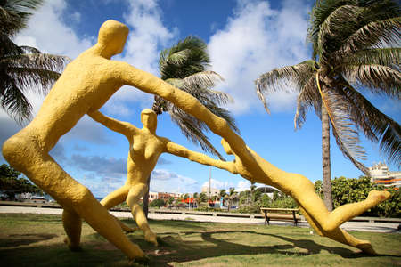 salvador, bahia, brazil - april 9, 2018: Sculpture of anchored men in Costa Azul Park in Salvador city.のeditorial素材