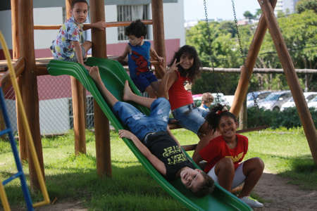 Salvador, Bahia, Brazil - May 7, 2022: Children play in a playground in a residential condominium in the city of Salvador.のeditorial素材