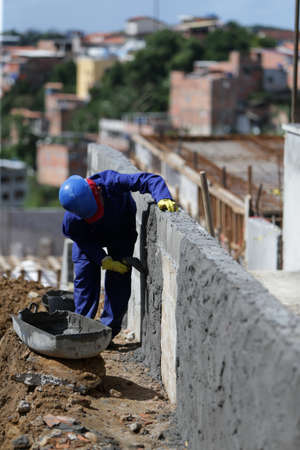 Salvador, Bahia, Brazil - June 6, 2022: workers in a construction of a state public school in the city of Salvador.のeditorial素材