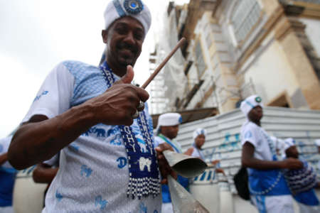 salvador, bahia, brazil - july 2, 2022: members of the Filhos de Gandhy carnival group during the...