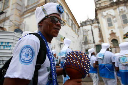 salvador, bahia, brazil - july 2, 2022: members of the Filhos de Gandhy carnival group during the Dois de Julho celebrations for the independence of Bahia in Salvador.のeditorial素材