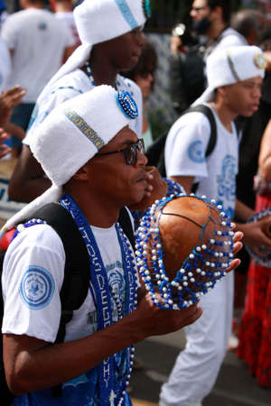 salvador, bahia, brazil - july 2, 2022: members of the Filhos de Gandhy carnival group during the...