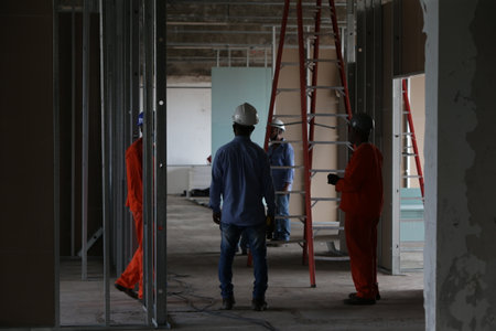 Salvador, Bahia, Brazil - June 6, 2022: worker in a construction of a public hospital in the city of Salvador.のeditorial素材
