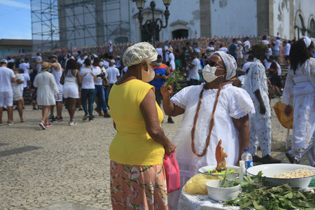 Salvador, Bahia, Brazil - January13, 2022: Adept of the Candomble religion near the Bonfim church in the city of Salvador.のeditorial素材
