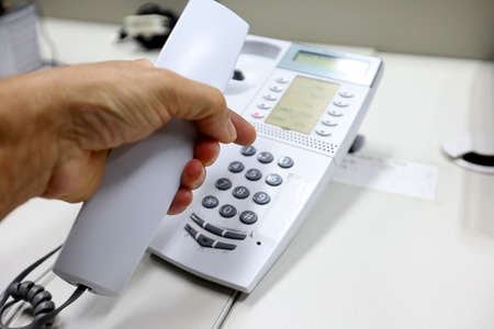 salvador, bahia, brazil - august 12, 2022: Landline phone in an office in the city of Salvador.