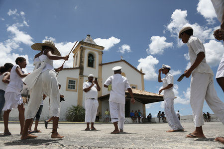 salvador, bahia, brazil - january 1, 2023: members of candombles make offerings on the beach in Umaita region in the city of Salvador.のeditorial素材