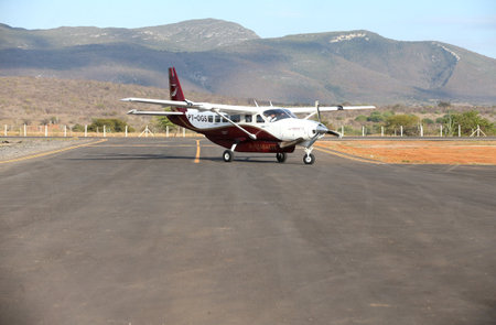 ituacu, bahia, brazil - august 25, 2023: aeronava cessna caravan 208b - PT-OGS - seen at the aerodrome of the city of Ituacu.のeditorial素材