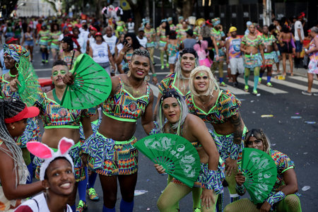 salvador, bahia, brazil - february 10, 2024: members of the As Muquiranas block are seen during the...