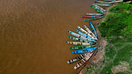 carinhanha, bahia, brazil - april 13, 2024: Fisherman's canoes are seen stuck on the banks of the...