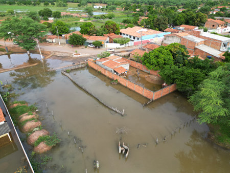 muquem de sao francisco, bahia, brazil - february 5, 2024: street flooded due to rain in the city of Muquem de Sao Francisco.のeditorial素材