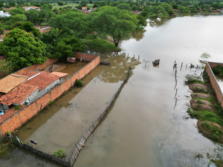 muquem de sao francisco, bahia, brazil - february 5, 2024: street flooded due to rain in the city of Muquem de Sao Francisco.のeditorial素材