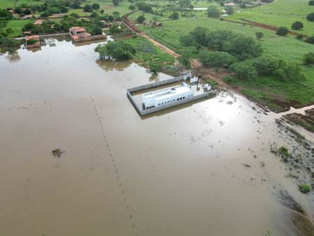 muquem de sao francisco, bahia, brazil - february 5, 2024: street flooded due to rain in the city of Muquem de Sao Francisco.のeditorial素材
