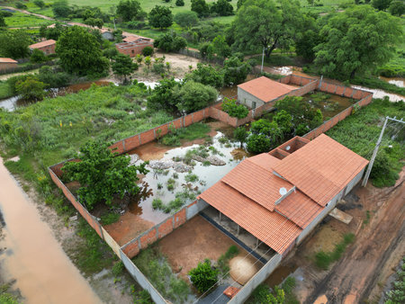 muquem de sao francisco, bahia, brazil - february 5, 2024: street flooded due to rain in the city of Muquem de Sao Francisco.のeditorial素材