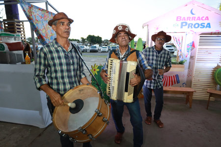salvador, bahia, brazil - may 28, 2024: Members of a forrÃ³ band are seen during a performance during the Sao Joao celebrations, in the city of Salvador.のeditorial素材