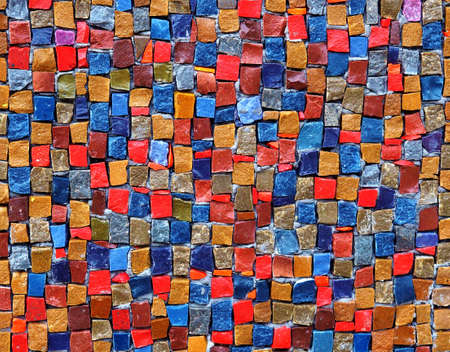 Colorful stone cubes on the wallの写真素材