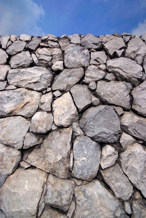 Sky and Stone wall backgroundの写真素材
