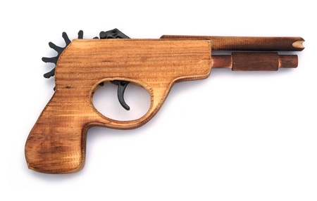 Toy wooden gun for child , on a white background の写真素材