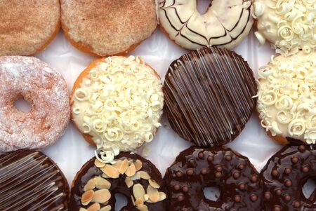 set of donuts in box close upの写真素材